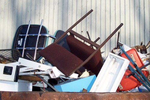 Construction workers removing debris from a site in Hackney
